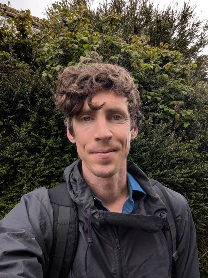 Portrait of Chris Harris outdoors.